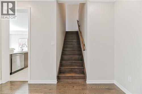 Hardwood flooring throughout the main level - 24 Weatherall Avenue, Cambridge, ON - Indoor Photo Showing Other Room