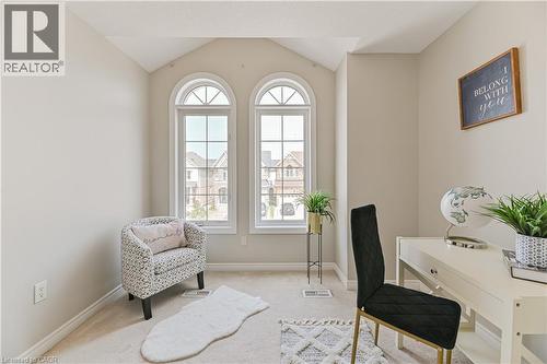Arched windows, vaulted ceiling, and neutral wall tones - 24 Weatherall Avenue, Cambridge, ON - Indoor