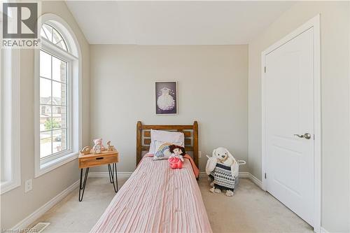 Arched window with gridded panes - 24 Weatherall Avenue, Cambridge, ON - Indoor Photo Showing Bedroom