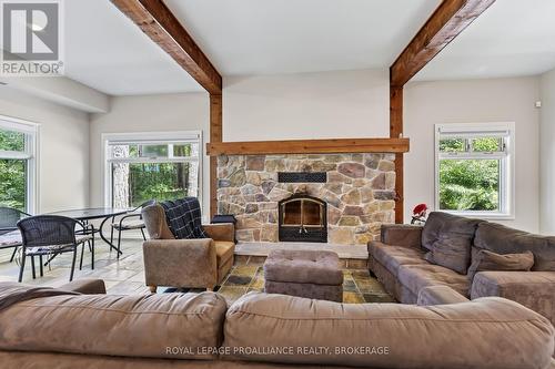 2300 County Road 32, Front Of Leeds & Seeleys Bay, ON - Indoor Photo Showing Living Room With Fireplace