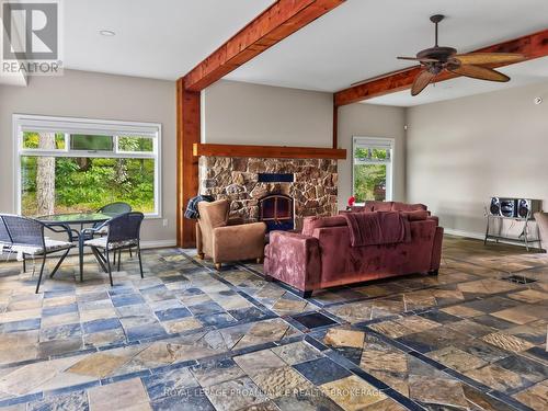 2300 County Road 32, Front Of Leeds & Seeleys Bay, ON - Indoor Photo Showing Living Room With Fireplace