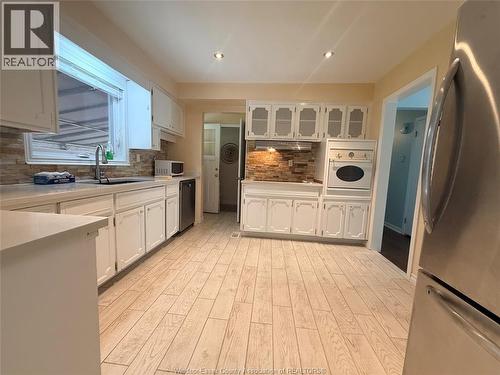 2450 ACADEMY DRIVE , Windsor, Ontario N9E 2G6 4
