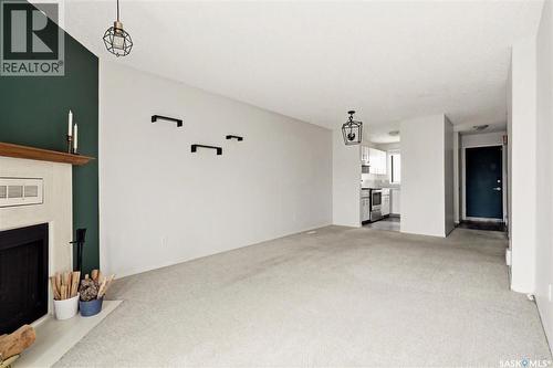 6419 Rochdale Boulevard, Regina, SK - Indoor With Fireplace