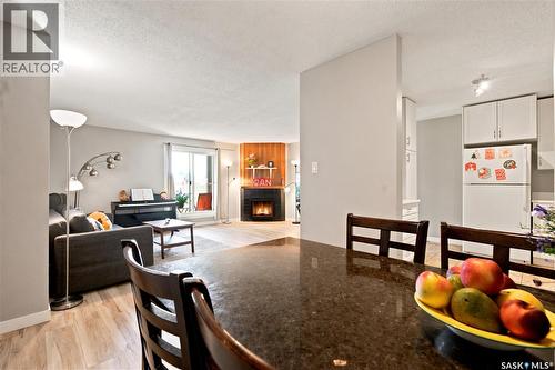 416 425 115Th Street E, Saskatoon, SK - Indoor Photo Showing Living Room With Fireplace