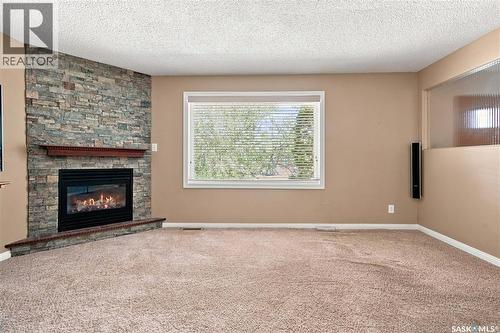 632 Grey Street, Regina, SK - Indoor Photo Showing Other Room With Fireplace