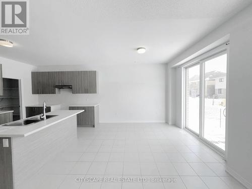 Eat-in-Breakfast Area - 259 Rea Drive, Centre Wellington, ON - Indoor Photo Showing Kitchen With Double Sink
