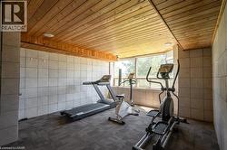 Wood-paneled ceiling with integrated lighting - 