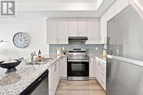 2607 Magdalen Path W, Oshawa (Windfields), ON - Indoor Photo Showing Kitchen With Stainless Steel Kitchen With Double Sink With Upgraded Kitchen