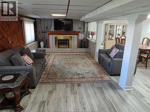 3767 Turner, Windsor, ON - Indoor Photo Showing Living Room With Fireplace