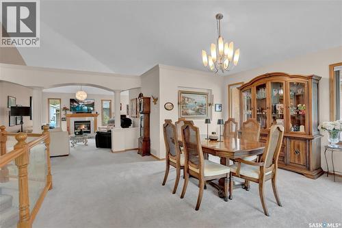 1146 Selo Place, Regina, SK - Indoor Photo Showing Dining Room With Fireplace