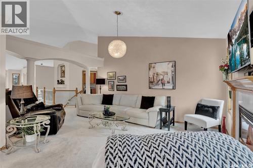 1146 Selo Place, Regina, SK - Indoor Photo Showing Living Room With Fireplace