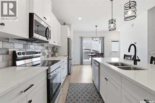 520 Brighton Gate, Saskatoon, SK - Indoor Photo Showing Kitchen With Double Sink With Upgraded Kitchen