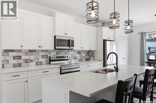 520 Brighton Gate, Saskatoon, SK - Indoor Photo Showing Kitchen With Double Sink With Upgraded Kitchen
