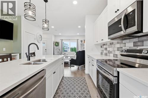 520 Brighton Gate, Saskatoon, SK - Indoor Photo Showing Kitchen With Double Sink With Upgraded Kitchen