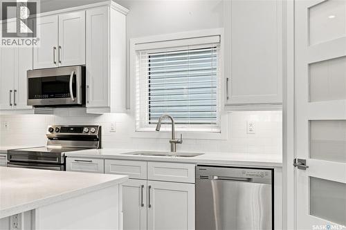 134 Bolstad Way, Saskatoon, SK - Indoor Photo Showing Kitchen With Stainless Steel Kitchen With Upgraded Kitchen