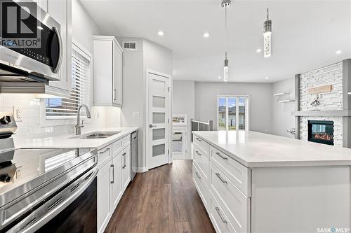 134 Bolstad Way, Saskatoon, SK - Indoor Photo Showing Kitchen With Double Sink With Upgraded Kitchen