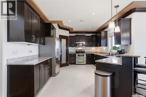 242 Denham Crescent, Saskatoon, SK - Indoor Photo Showing Kitchen With Upgraded Kitchen