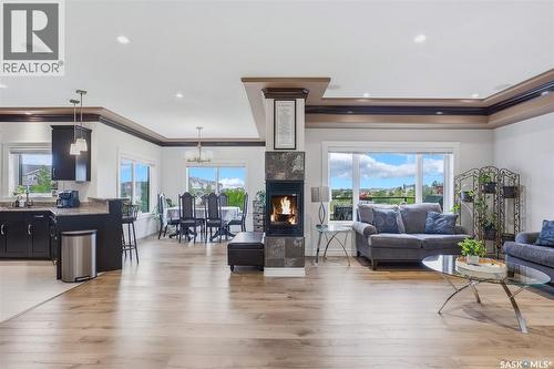 242 Denham Crescent, Saskatoon, SK - Indoor Photo Showing Living Room With Fireplace