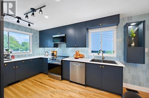 2108 Falmouth Terrace, Burlington, ON - Indoor Photo Showing Kitchen With Stainless Steel Kitchen With Double Sink
