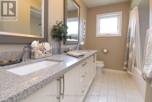 Upper bathroom, stone counter with double sinks - 470 Amanda Crescent, Burlington, ON - Indoor Photo Showing Bathroom