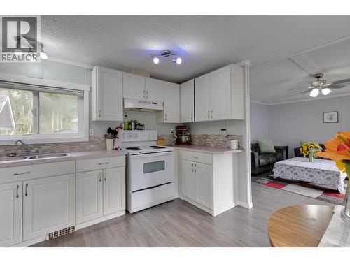 181 2500 Grant Road, Prince George, BC - Indoor Photo Showing Kitchen With Double Sink