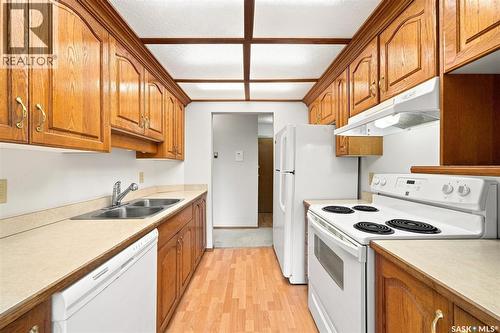 202 1215 Louise Avenue, Saskatoon, SK - Indoor Photo Showing Kitchen With Double Sink