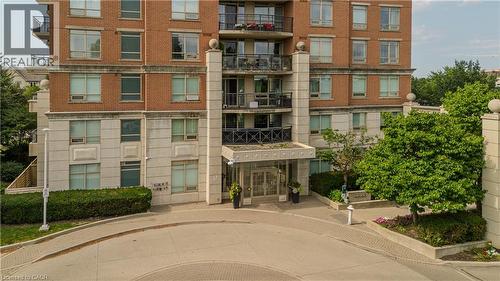 2325 Central Park Drive Unit# 709, Oakville, ON - Outdoor With Balcony With Facade