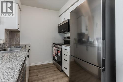 2325 Central Park Drive Unit# 709, Oakville, ON - Indoor Photo Showing Kitchen