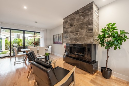 Salon - 345 Rue Narbonne, Sainte-Julie, QC - Indoor Photo Showing Living Room With Fireplace