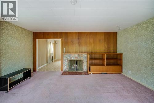 306 Sylvia Crescent, Trail, BC - Indoor Photo Showing Other Room With Fireplace