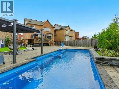 200 Giddings Crescent, Milton, ON - Outdoor With In Ground Pool