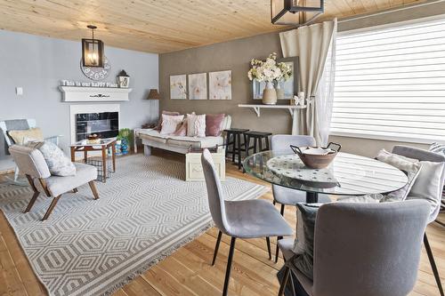 711 Ibbitson Street, Creston, BC - Indoor Photo Showing Dining Room With Fireplace