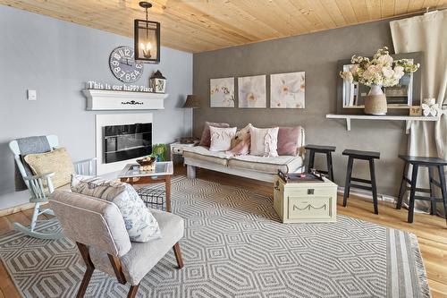 711 Ibbitson Street, Creston, BC - Indoor Photo Showing Living Room With Fireplace