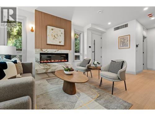 4 1491 Devonshire Crescent, Vancouver, BC - Indoor Photo Showing Living Room With Fireplace