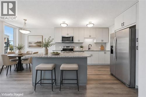 Virtually Staged - 525 Erinbrook Drive Unit# B046, Kitchener, ON - Indoor Photo Showing Kitchen With Upgraded Kitchen