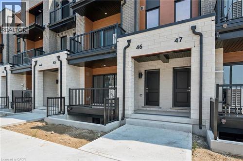 525 Erinbrook Drive Unit# B046, Kitchener, ON - Outdoor With Balcony With Facade