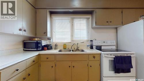 1208 Bond Street, Regina, SK - Indoor Photo Showing Kitchen With Double Sink