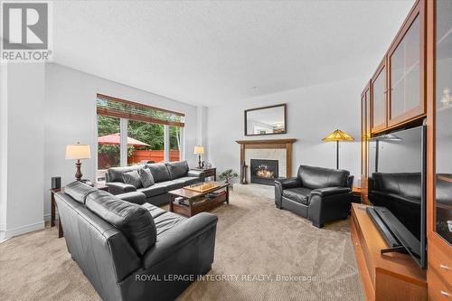 40 Bon Echo Crescent, Ottawa, ON - Indoor Photo Showing Living Room With Fireplace