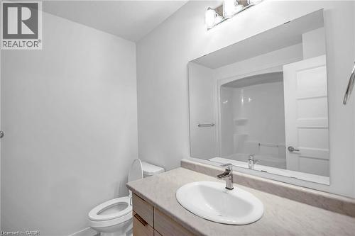 Vanity with an oval undermount sink, chrome faucet, and integrated countertop - 961 Battery Park, London, ON - Indoor Photo Showing Bathroom