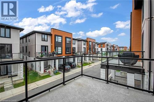 Private balcony with glass panel railing and concrete flooring - 961 Battery Park, London, ON - Outdoor With Balcony