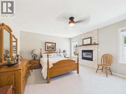 3400 Ontario Ave, Powell River, BC - Indoor Photo Showing Bedroom With Fireplace