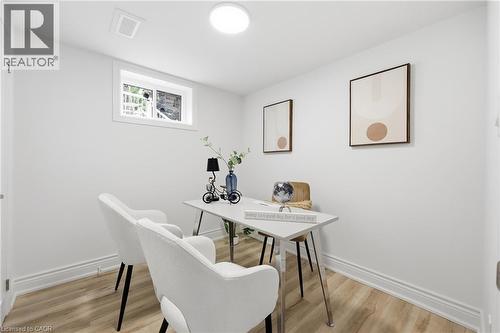 Recessed window with white trim, wood-finish flooring, white walls, and a ceiling-mounted light fixture - 156 East 36Th Street, Hamilton, ON - Indoor