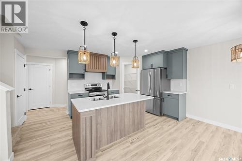 286 Froese Crescent, Warman, SK - Indoor Photo Showing Kitchen With Stainless Steel Kitchen