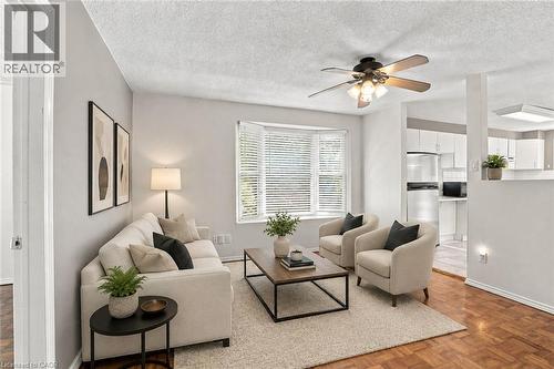 Virtually Staged - 24 Hill Street, Hamilton, ON - Indoor Photo Showing Living Room