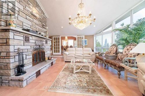 29 Milton Street, Tiny, ON - Indoor Photo Showing Living Room With Fireplace