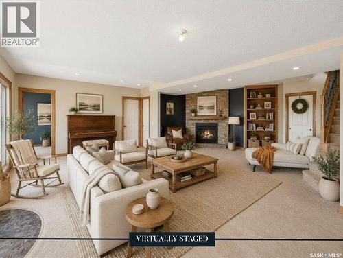North Sk Landing Acreage, Saskatchewan Landing, SK - Indoor Photo Showing Living Room With Fireplace