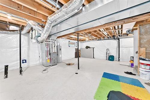 6 Dedrick Bay, Winnipeg, MB - Indoor Photo Showing Basement