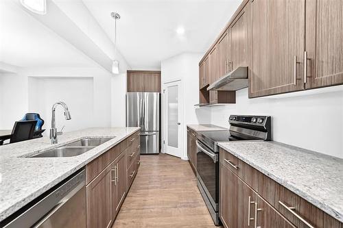 6 Dedrick Bay, Winnipeg, MB - Indoor Photo Showing Kitchen With Double Sink With Upgraded Kitchen