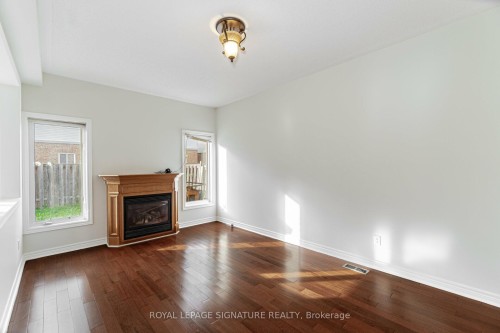 1015 Eager Road, Milton, ON - Indoor Photo Showing Living Room With Fireplace