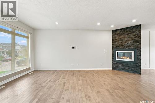 215 Padget Crescent, Saskatoon, SK - Indoor With Fireplace